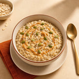 Prepared bowl of NEUTOOFIT Butter Scotch high protein oats